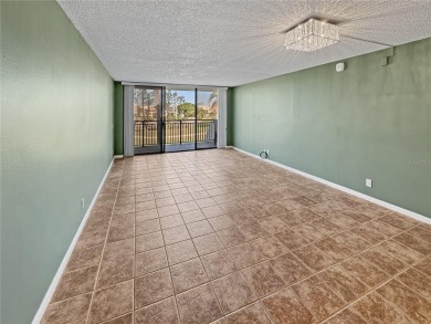 Under contract-accepting backup offers. Experience tranquility on Isla Del Sol Yacht and Country Club in Florida - for sale on GolfHomes.com, golf home, golf lot
