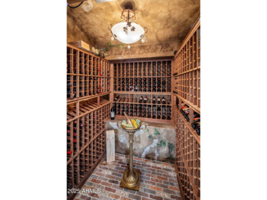 Set on an expansive acre-plus lot within Hidden Paradise--a on Camelback Golf Club in Arizona - for sale on GolfHomes.com, golf home, golf lot