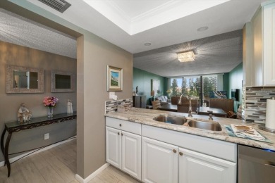 Under contract-accepting backup offers. Experience tranquility on Isla Del Sol Yacht and Country Club in Florida - for sale on GolfHomes.com, golf home, golf lot