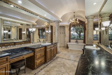 Set on an expansive acre-plus lot within Hidden Paradise--a on Camelback Golf Club in Arizona - for sale on GolfHomes.com, golf home, golf lot