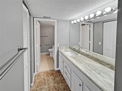 Under contract-accepting backup offers. Experience tranquility on Isla Del Sol Yacht and Country Club in Florida - for sale on GolfHomes.com, golf home, golf lot