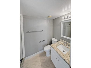 Under contract-accepting backup offers. Experience tranquility on Isla Del Sol Yacht and Country Club in Florida - for sale on GolfHomes.com, golf home, golf lot