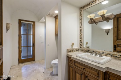 Set on an expansive acre-plus lot within Hidden Paradise--a on Camelback Golf Club in Arizona - for sale on GolfHomes.com, golf home, golf lot