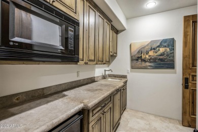 Set on an expansive acre-plus lot within Hidden Paradise--a on Camelback Golf Club in Arizona - for sale on GolfHomes.com, golf home, golf lot