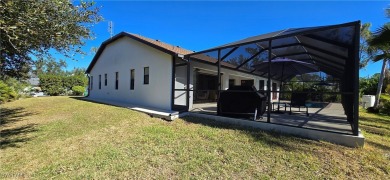 Welcome to your dream home in beautiful Port Charlotte! This on Port Charlotte Golf Club in Florida - for sale on GolfHomes.com, golf home, golf lot