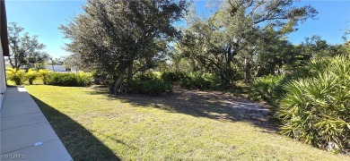 Welcome to your dream home in beautiful Port Charlotte! This on Port Charlotte Golf Club in Florida - for sale on GolfHomes.com, golf home, golf lot