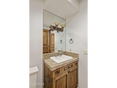 Set on an expansive acre-plus lot within Hidden Paradise--a on Camelback Golf Club in Arizona - for sale on GolfHomes.com, golf home, golf lot