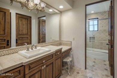 Set on an expansive acre-plus lot within Hidden Paradise--a on Camelback Golf Club in Arizona - for sale on GolfHomes.com, golf home, golf lot