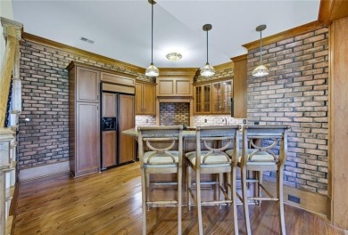 Nestled on a private cul-de-sac, this custom-designed estate on Chestatee Golf Club in Georgia - for sale on GolfHomes.com, golf home, golf lot