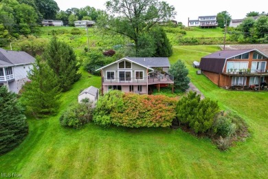 Welcome to your dream lakefront retreat with breathtaking views! on Lake Mohawk Golf Club in Ohio - for sale on GolfHomes.com, golf home, golf lot