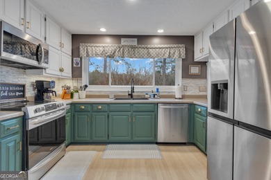 From sunsets over the fairway to your own private backyard oasis on Canongate At Flat Creek Club in Georgia - for sale on GolfHomes.com, golf home, golf lot