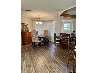 Welcome to this beautifully crafted ranch-style residence that on Mount Pleasant Country Club in Texas - for sale on GolfHomes.com, golf home, golf lot