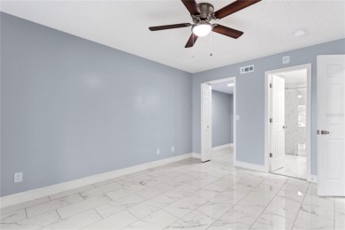 PRICE IMPROVEMENT: $267,000! Your perfect Florida oasis awaits on Clearwater Executive Golf Course in Florida - for sale on GolfHomes.com, golf home, golf lot