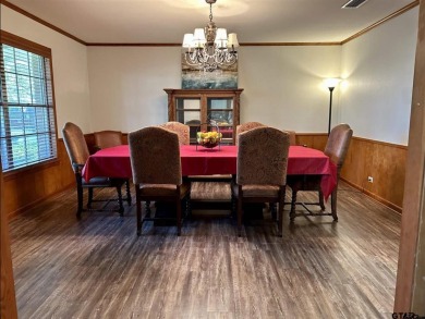 Welcome to this beautifully crafted ranch-style residence that on Mount Pleasant Country Club in Texas - for sale on GolfHomes.com, golf home, golf lot