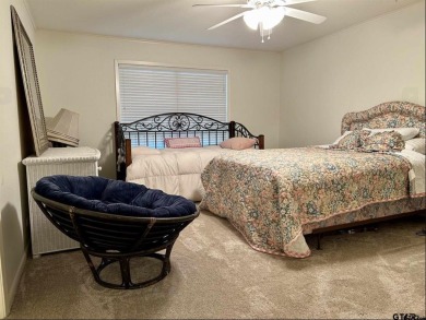 Welcome to this beautifully crafted ranch-style residence that on Mount Pleasant Country Club in Texas - for sale on GolfHomes.com, golf home, golf lot