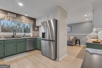 From sunsets over the fairway to your own private backyard oasis on Canongate At Flat Creek Club in Georgia - for sale on GolfHomes.com, golf home, golf lot