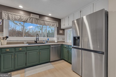 From sunsets over the fairway to your own private backyard oasis on Canongate At Flat Creek Club in Georgia - for sale on GolfHomes.com, golf home, golf lot