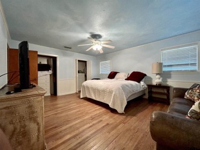 Welcome to this beautifully crafted ranch-style residence that on Mount Pleasant Country Club in Texas - for sale on GolfHomes.com, golf home, golf lot