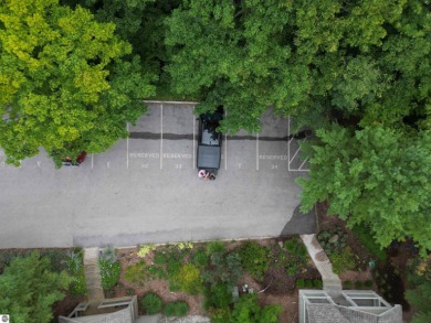 Discover a one-of-a-kind opportunity to build your dream cottage on  in Michigan - for sale on GolfHomes.com, golf home, golf lot