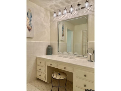 Welcome to this beautifully crafted ranch-style residence that on Mount Pleasant Country Club in Texas - for sale on GolfHomes.com, golf home, golf lot