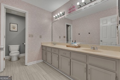 From sunsets over the fairway to your own private backyard oasis on Canongate At Flat Creek Club in Georgia - for sale on GolfHomes.com, golf home, golf lot