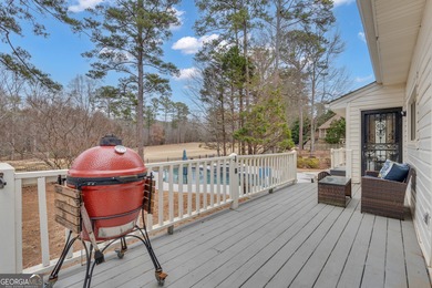 From sunsets over the fairway to your own private backyard oasis on Canongate At Flat Creek Club in Georgia - for sale on GolfHomes.com, golf home, golf lot