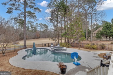 From sunsets over the fairway to your own private backyard oasis on Canongate At Flat Creek Club in Georgia - for sale on GolfHomes.com, golf home, golf lot