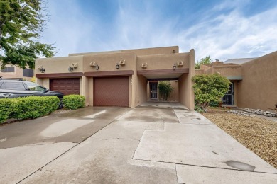 Well maintained Northeast Heights townhome on a low traffic on Arroyo Del Oso Golf Course in New Mexico - for sale on GolfHomes.com, golf home, golf lot