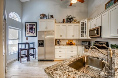 Just steps from the pool, this beautifully maintained 2-bedroom on PGA National Golf Club in Florida - for sale on GolfHomes.com, golf home, golf lot