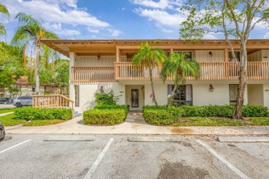 Tastefully Remodeled 1st Floor Golf Villa Unit. Front Bedroom on PGA National Golf Club in Florida - for sale on GolfHomes.com, golf home, golf lot