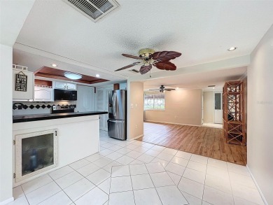 Lakefront Living in Beacon Woods Village with no flood insurance on Beacon Woods Golf Club in Florida - for sale on GolfHomes.com, golf home, golf lot