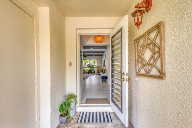 Tastefully Remodeled 1st Floor Golf Villa Unit. Front Bedroom on PGA National Golf Club in Florida - for sale on GolfHomes.com, golf home, golf lot