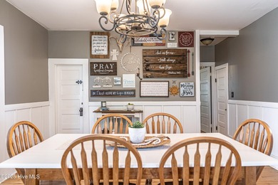 Look at this charming historic home with modern updates on an on Whispering Woods in North Carolina - for sale on GolfHomes.com, golf home, golf lot