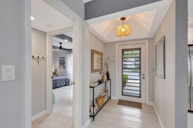 Tastefully Remodeled 1st Floor Golf Villa Unit. Front Bedroom on PGA National Golf Club in Florida - for sale on GolfHomes.com, golf home, golf lot