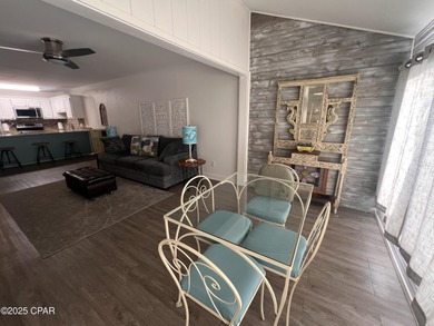 This spacious second-story unit offers unparalleled views of on Bay Point Resort Golf Club in Florida - for sale on GolfHomes.com, golf home, golf lot