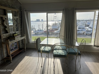 This spacious second-story unit offers unparalleled views of on Bay Point Resort Golf Club in Florida - for sale on GolfHomes.com, golf home, golf lot