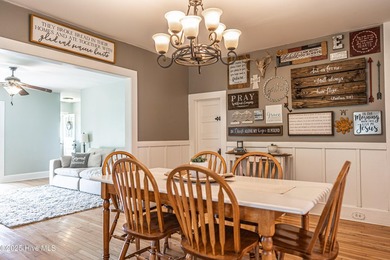 Look at this charming historic home with modern updates on an on Whispering Woods in North Carolina - for sale on GolfHomes.com, golf home, golf lot