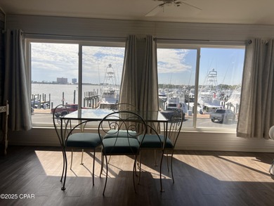 This spacious second-story unit offers unparalleled views of on Bay Point Resort Golf Club in Florida - for sale on GolfHomes.com, golf home, golf lot