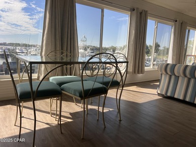 This spacious second-story unit offers unparalleled views of on Bay Point Resort Golf Club in Florida - for sale on GolfHomes.com, golf home, golf lot