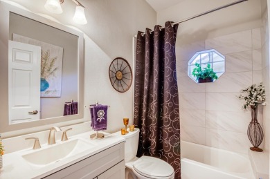 Just steps from the pool, this beautifully maintained 2-bedroom on PGA National Golf Club in Florida - for sale on GolfHomes.com, golf home, golf lot
