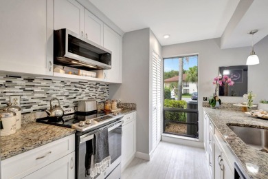 Tastefully Remodeled 1st Floor Golf Villa Unit. Front Bedroom on PGA National Golf Club in Florida - for sale on GolfHomes.com, golf home, golf lot