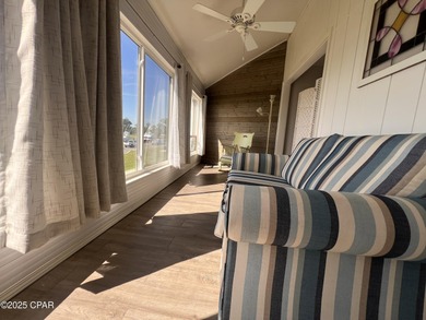 This spacious second-story unit offers unparalleled views of on Bay Point Resort Golf Club in Florida - for sale on GolfHomes.com, golf home, golf lot