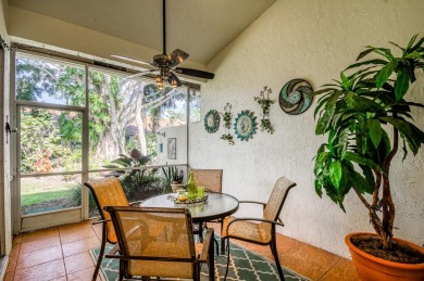 Just steps from the pool, this beautifully maintained 2-bedroom on PGA National Golf Club in Florida - for sale on GolfHomes.com, golf home, golf lot
