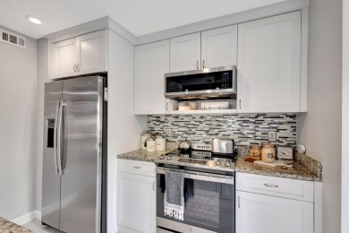 Tastefully Remodeled 1st Floor Golf Villa Unit. Front Bedroom on PGA National Golf Club in Florida - for sale on GolfHomes.com, golf home, golf lot