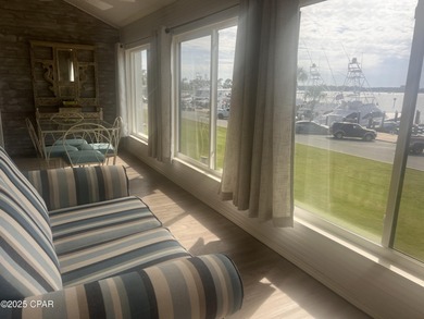 This spacious second-story unit offers unparalleled views of on Bay Point Resort Golf Club in Florida - for sale on GolfHomes.com, golf home, golf lot