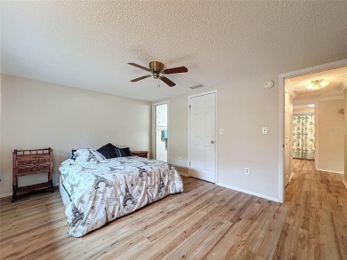 Lakefront Living in Beacon Woods Village with no flood insurance on Beacon Woods Golf Club in Florida - for sale on GolfHomes.com, golf home, golf lot