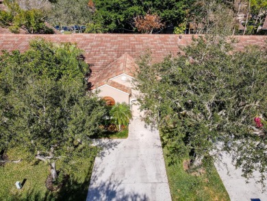 Just steps from the pool, this beautifully maintained 2-bedroom on PGA National Golf Club in Florida - for sale on GolfHomes.com, golf home, golf lot