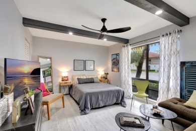 Tastefully Remodeled 1st Floor Golf Villa Unit. Front Bedroom on PGA National Golf Club in Florida - for sale on GolfHomes.com, golf home, golf lot