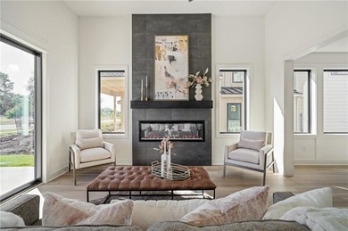 Discover modern, low-maintenance living in this stunning 1 on The Golf Club of Kansas in Kansas - for sale on GolfHomes.com, golf home, golf lot