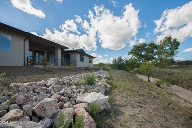 This elegant 3-bedroom, 2-bath home with a 2-car garage and a on Antelope Hills Golf Courses in Arizona - for sale on GolfHomes.com, golf home, golf lot